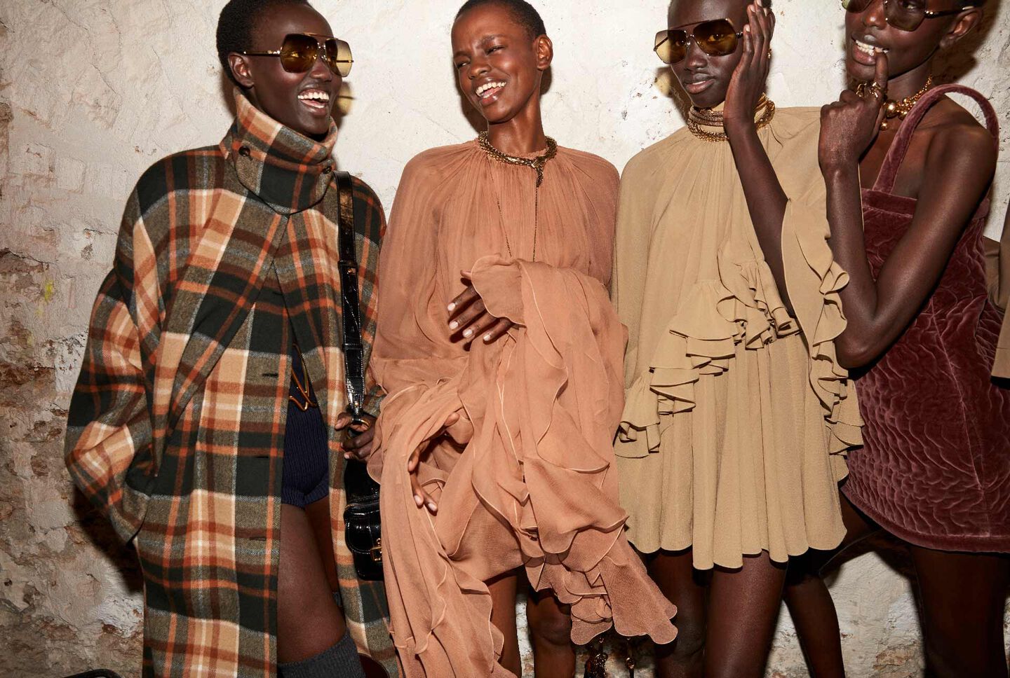 Joyful models in the backstage of Winter 24 show