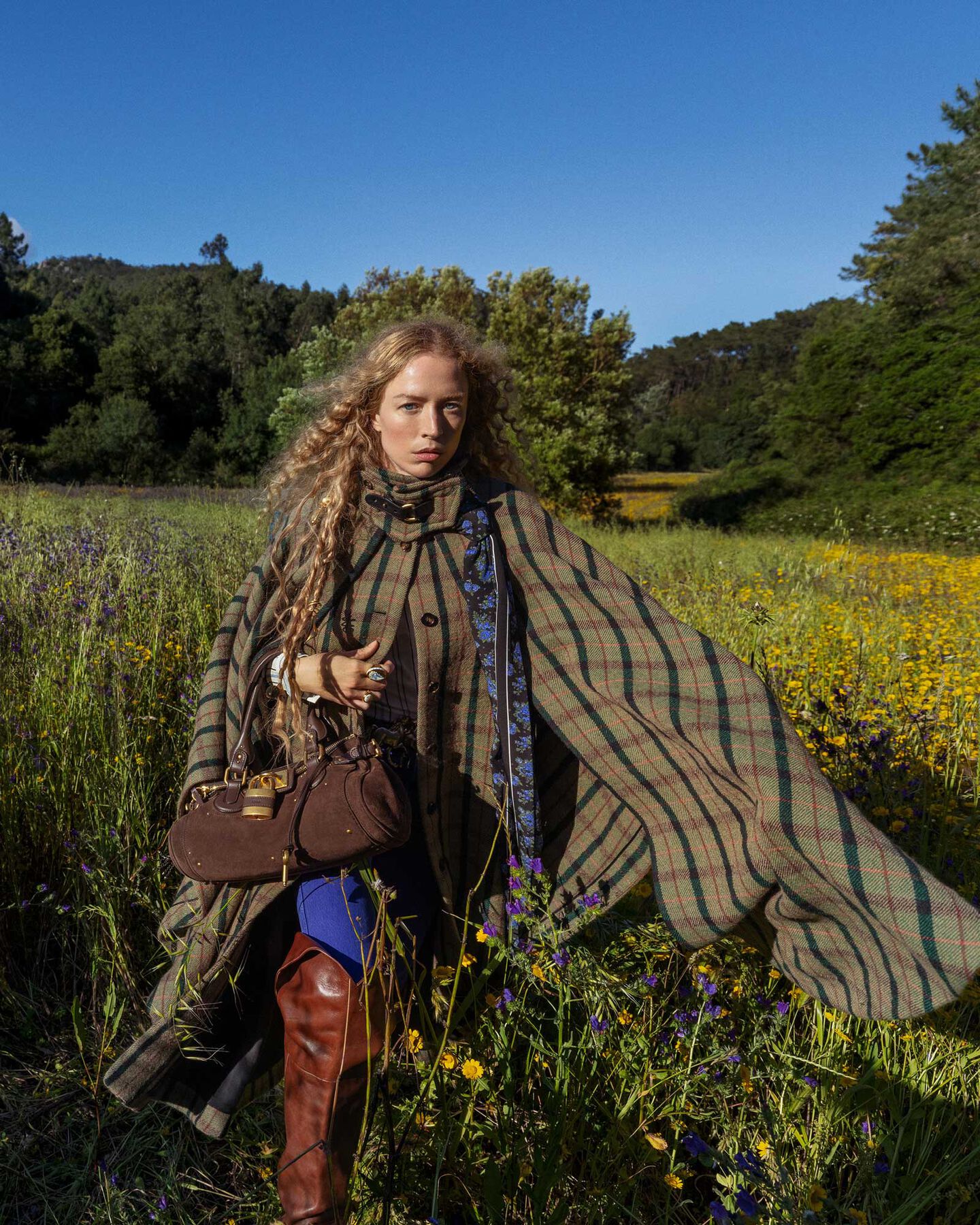 Chlo&eacute; Model Raquel Zimmerman wearing a tartan cape for Winter 26 campaign