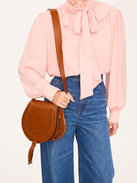 Bolso saddle Marcie de cuero brillante