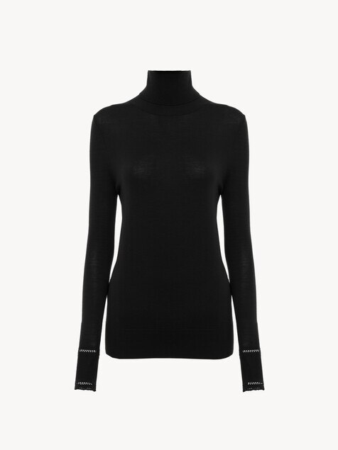 Top ajustado de cuello alto de punto de lana