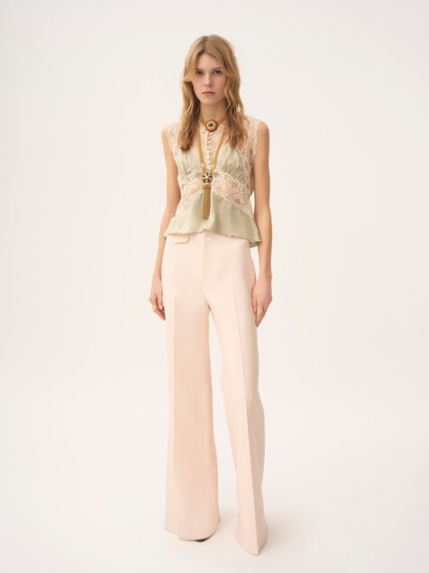 High-rise flared pants in wool gabardine