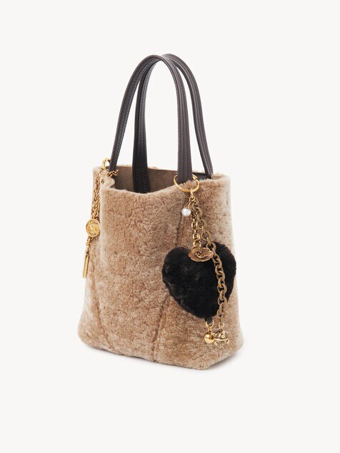 Chlo&eacute; Symbols Heart Shearling bag charm in brass