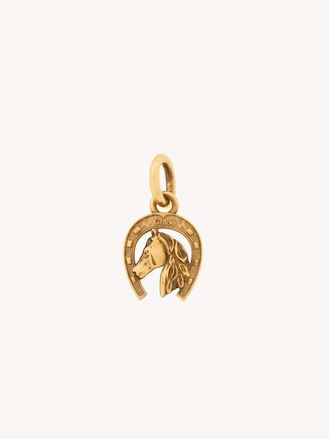 Horseshoe charm in brass