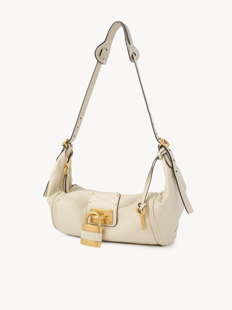 Sac bandouli&egrave;re Paddington en cuir grain&eacute;