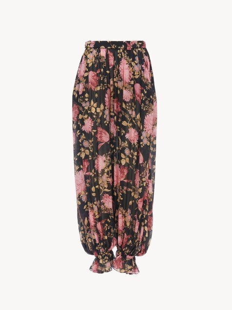 Fluid pleated trousers in silk charmeuse