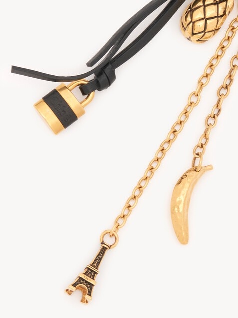 Miniatures bag charm in brass & leather