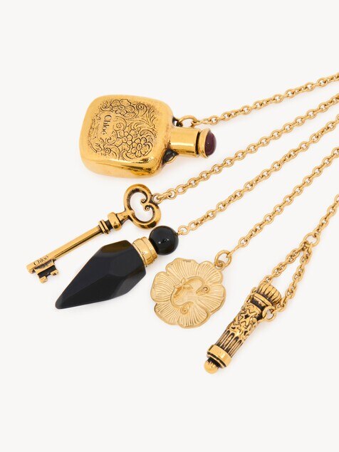 The Ch&acirc;teau Treasures charm in brass & resin