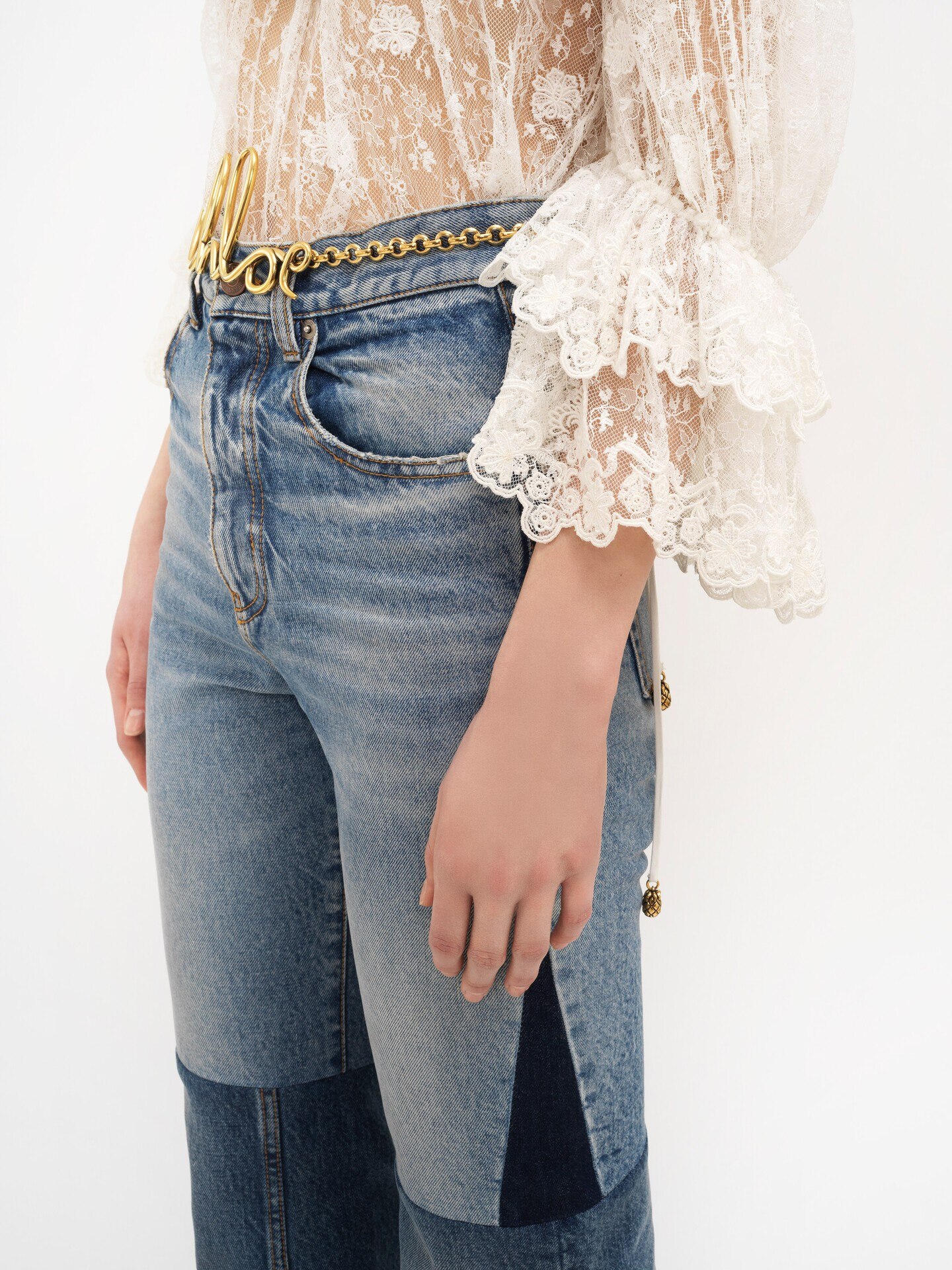 Flared patchwork jeans in denim - 8