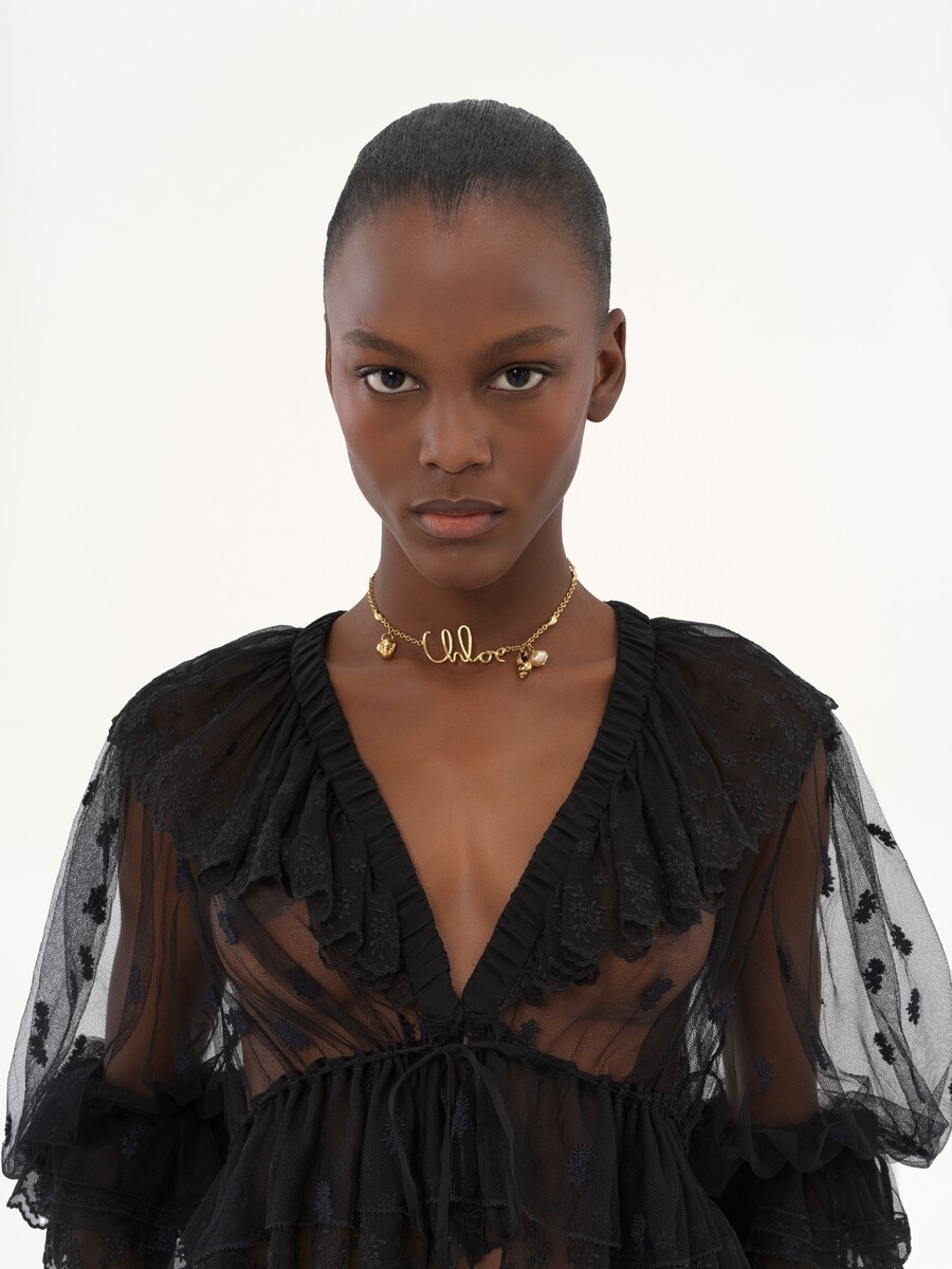 V-neck ruffle top in embroidered lace - 8