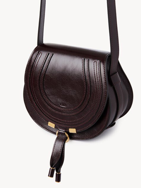 Small Marcie saddle bag in shiny leather