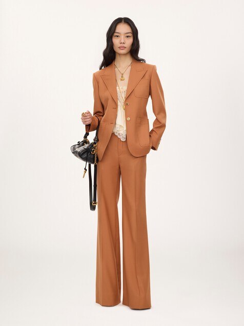 High-rise flared pants in wool gabardine