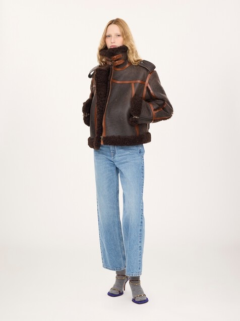 High-neck jacket in shearling