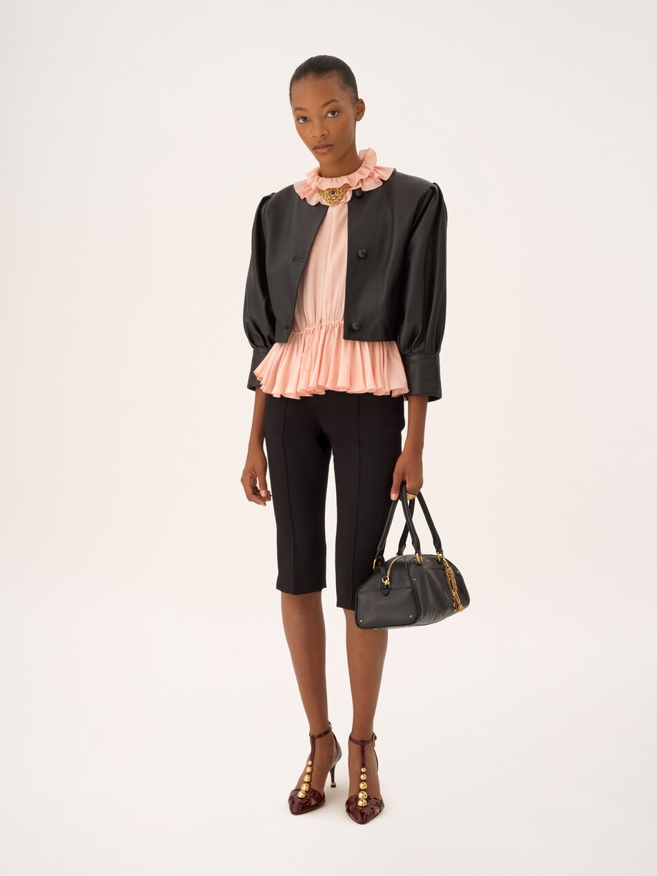 Cropped collarless jacket in leather