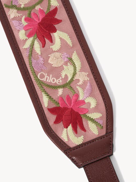Grained leather strap with floral embroidery