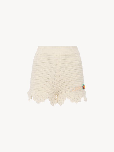 Hoch taillierte Mini-Shorts aus H&auml;kelstrick mit Logo