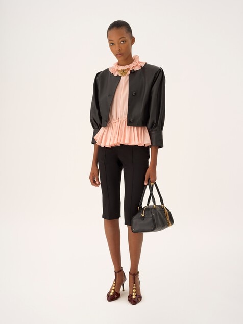 Cropped collarless jacket in leather