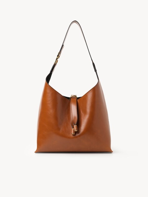Bolso hobo peque&ntilde;o Marcie de cuero brillante