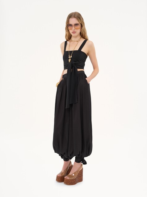 Fluid pleated trousers in silk charmeuse