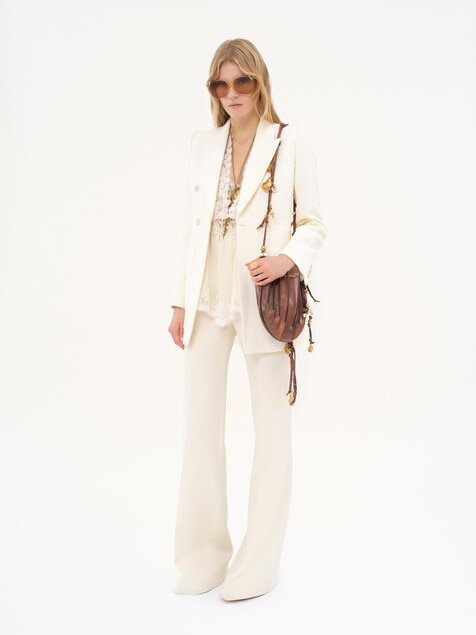 High-rise flared pants in wool grain de poudre