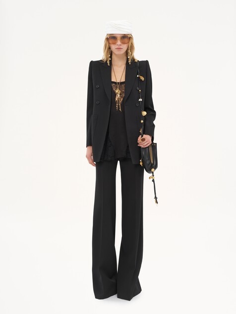 High-rise flared pants in wool grain de poudre