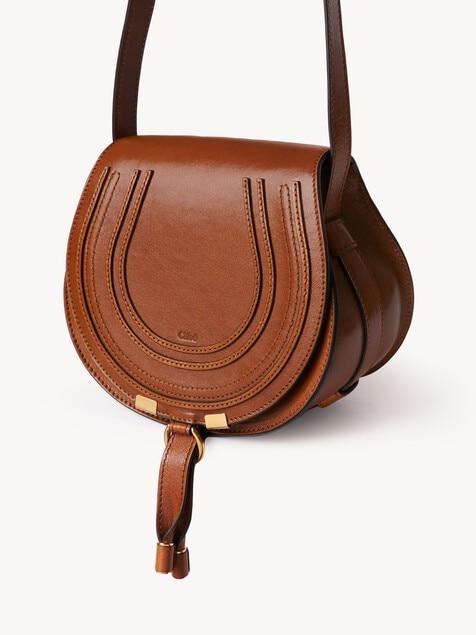 Small Marcie saddle bag in shiny leather