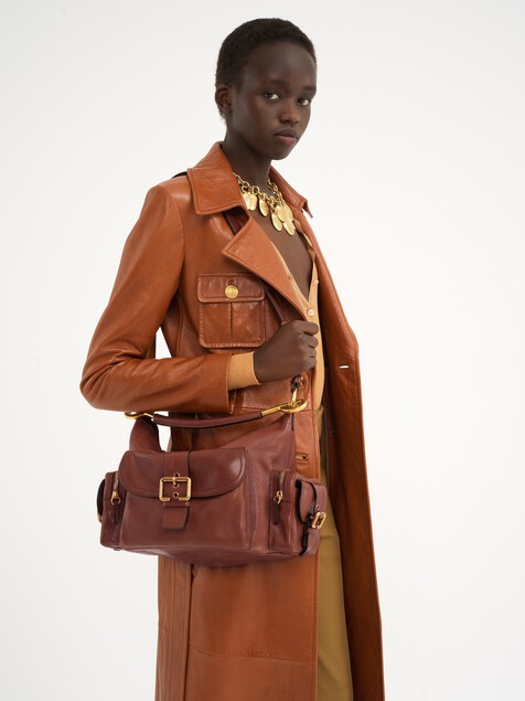Camera bag in shiny leather