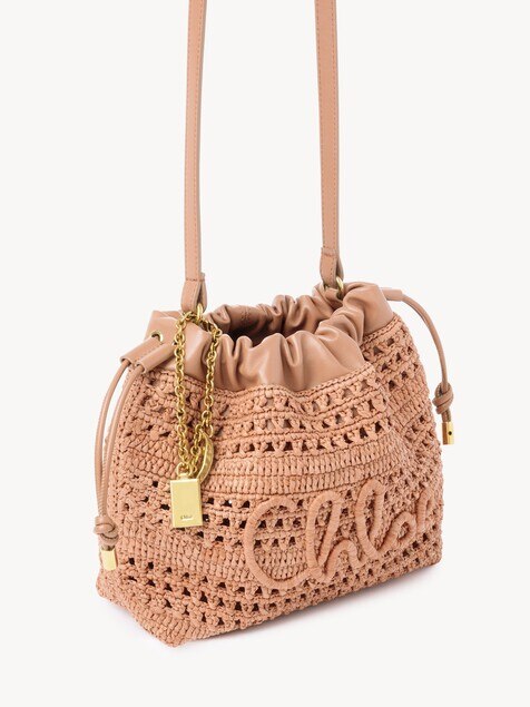 Mini Summer Banana drawstring shoulder bag in raffia