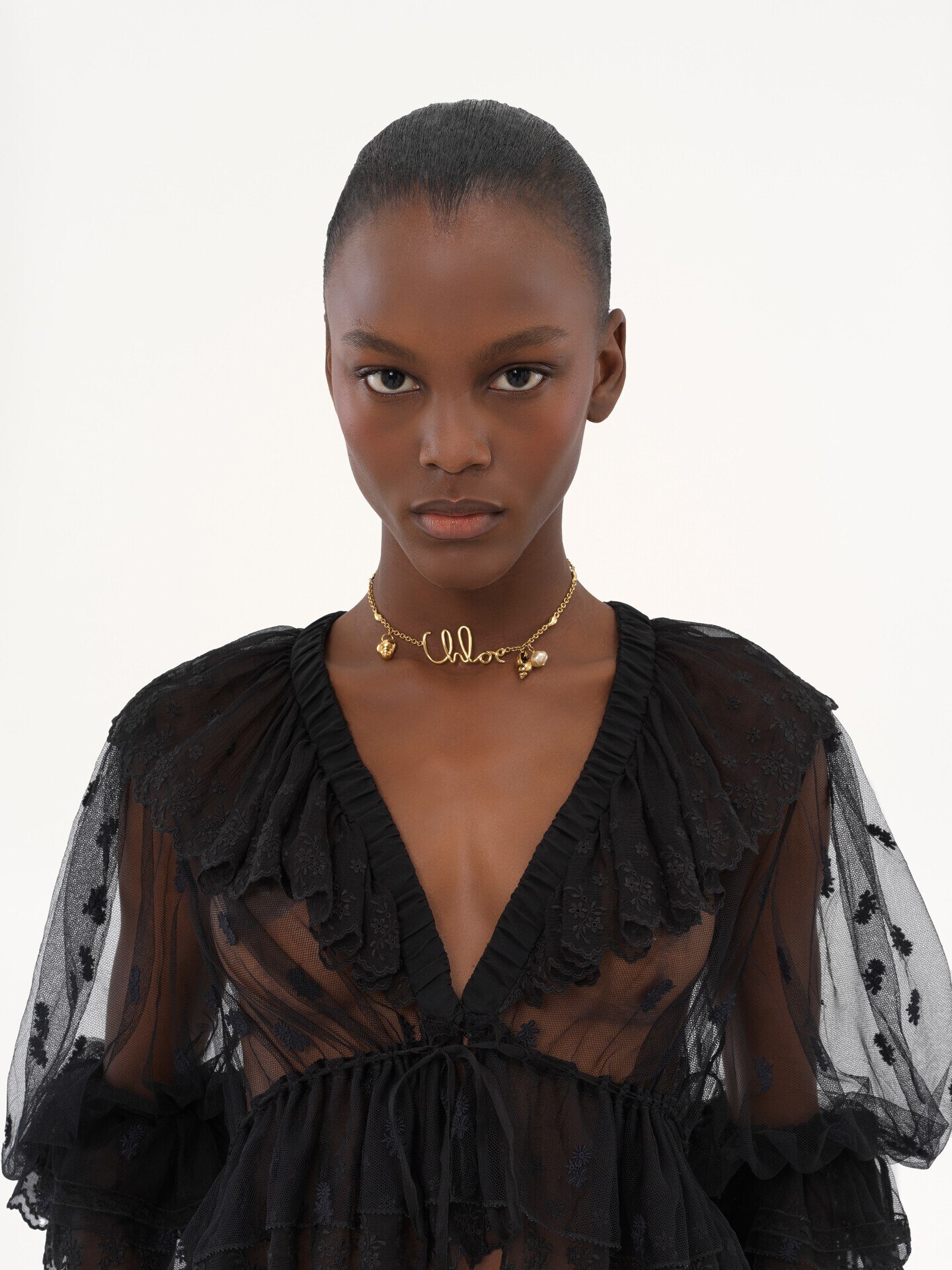 V-neck ruffle top in embroidered lace - 8