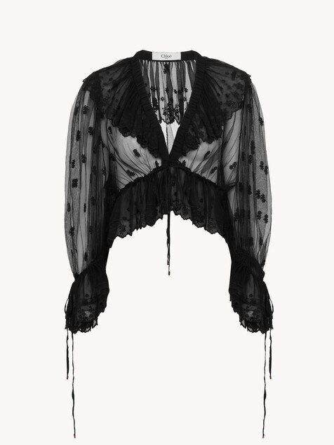 Top de volantes con cuello en V de encaje bordado