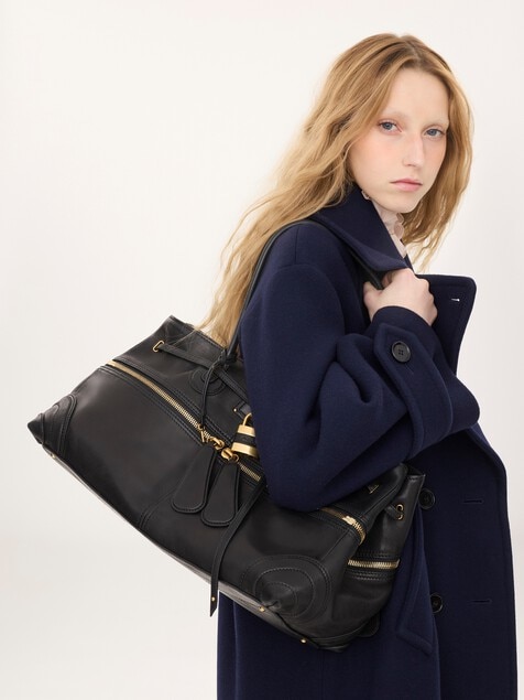 Bolso East-West Paddington Sling grande de cuero suave