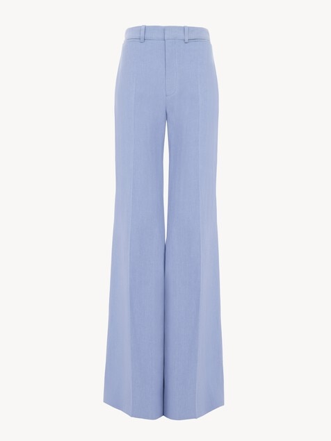 Flared high-rise trousers in linen cr&ecirc;pe