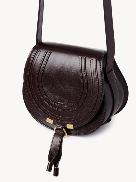 Small Marcie saddle bag in shiny leather