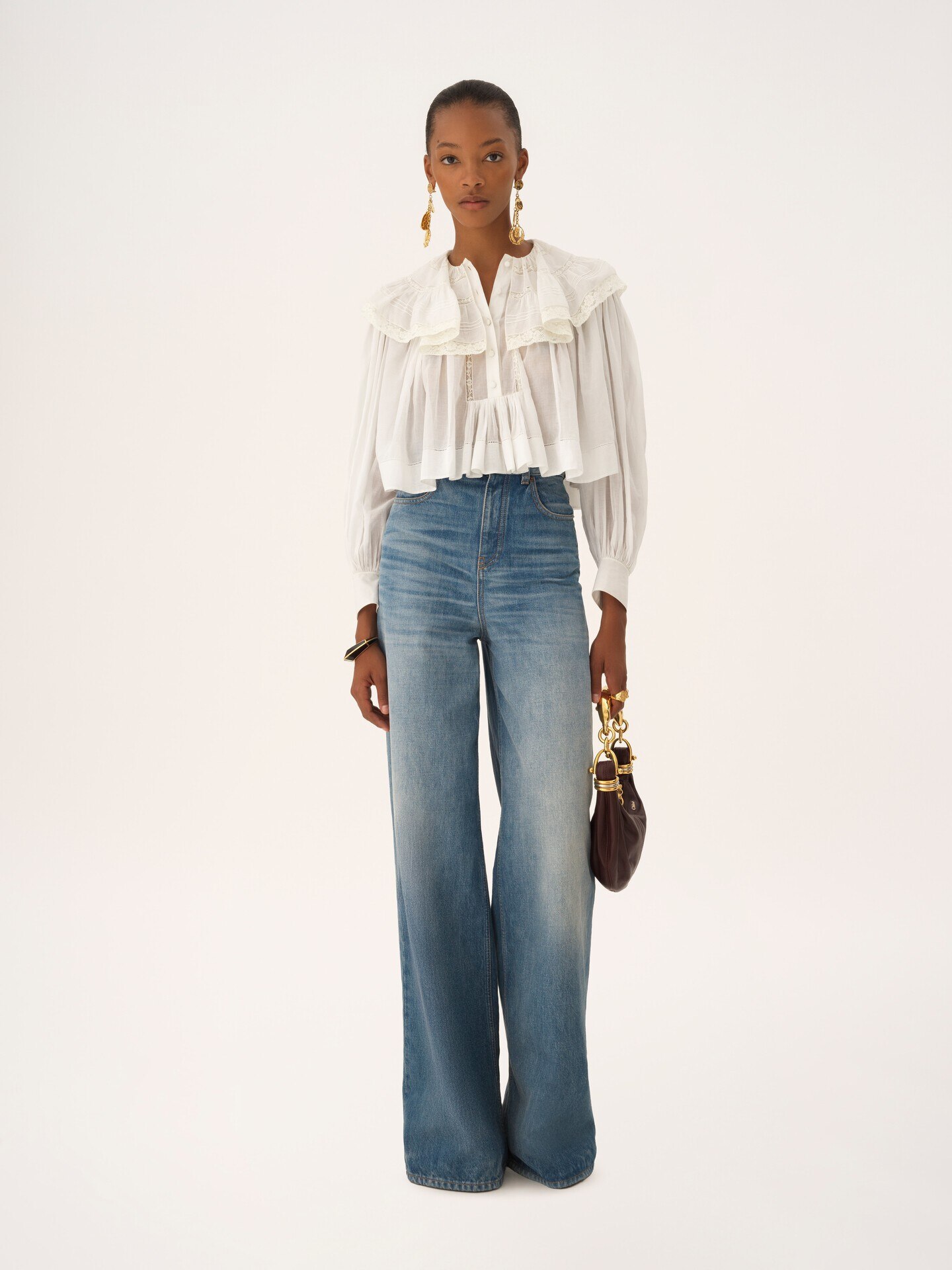 High-rise wide-leg jeans in denim - 1.0