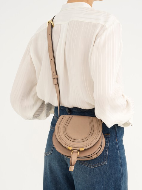 Small Marcie saddle bag in shiny leather