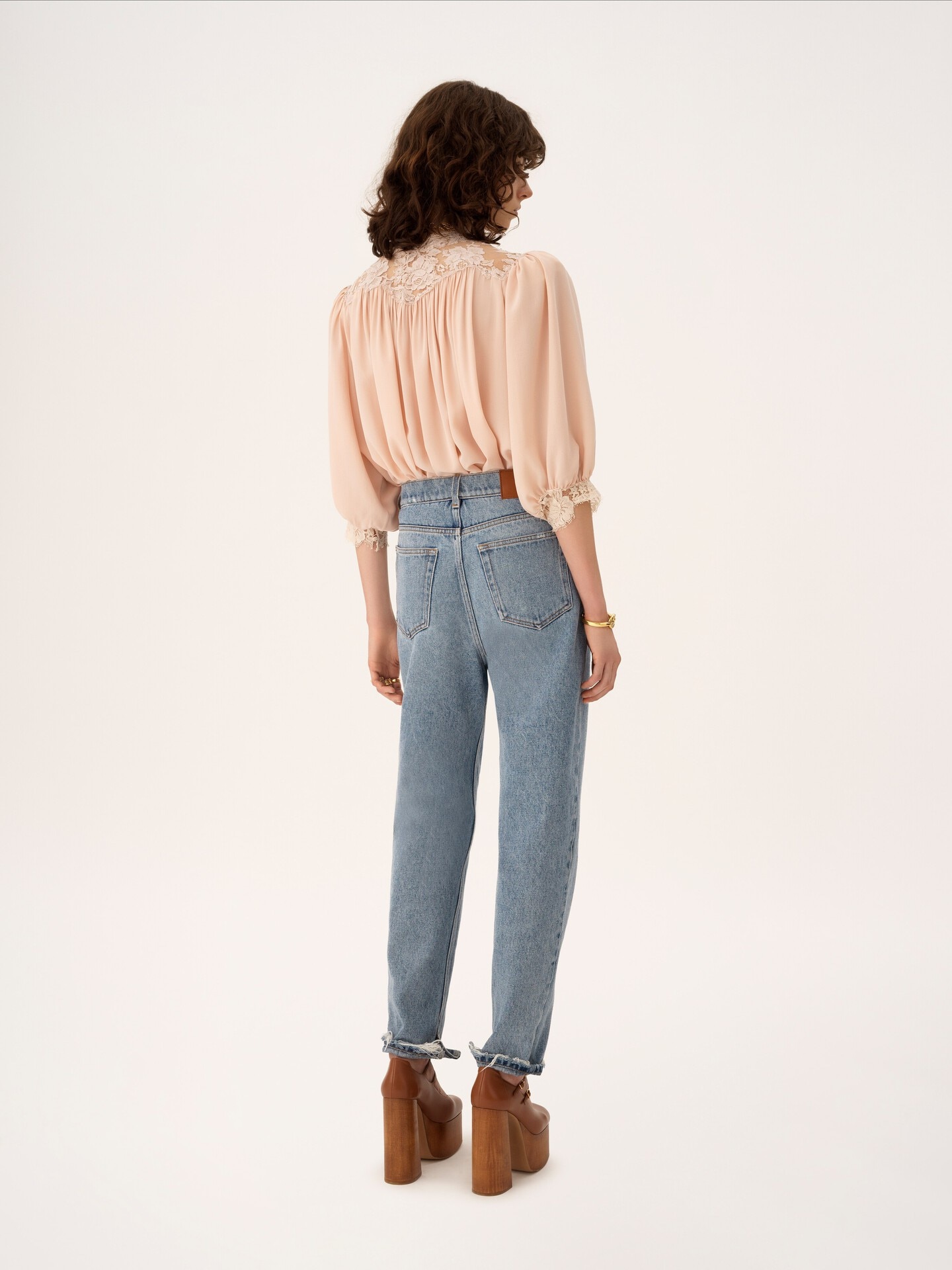 High-rise tapered jeans in denim - 5