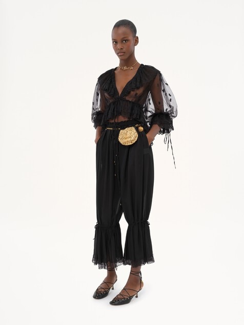 R&uuml;schen-Top aus bestickter Spitze mit V-Ausschnitt