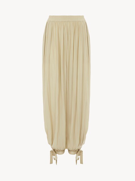 Fluid pleated pants in washed technical satin