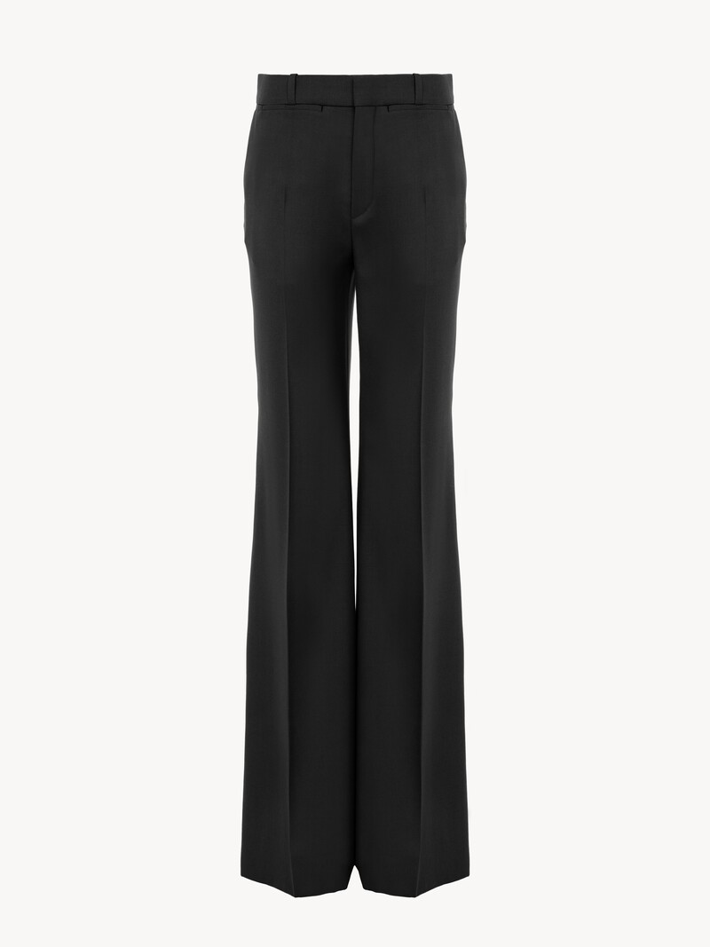 High-rise flared pants in wool grain de poudre by Chloé