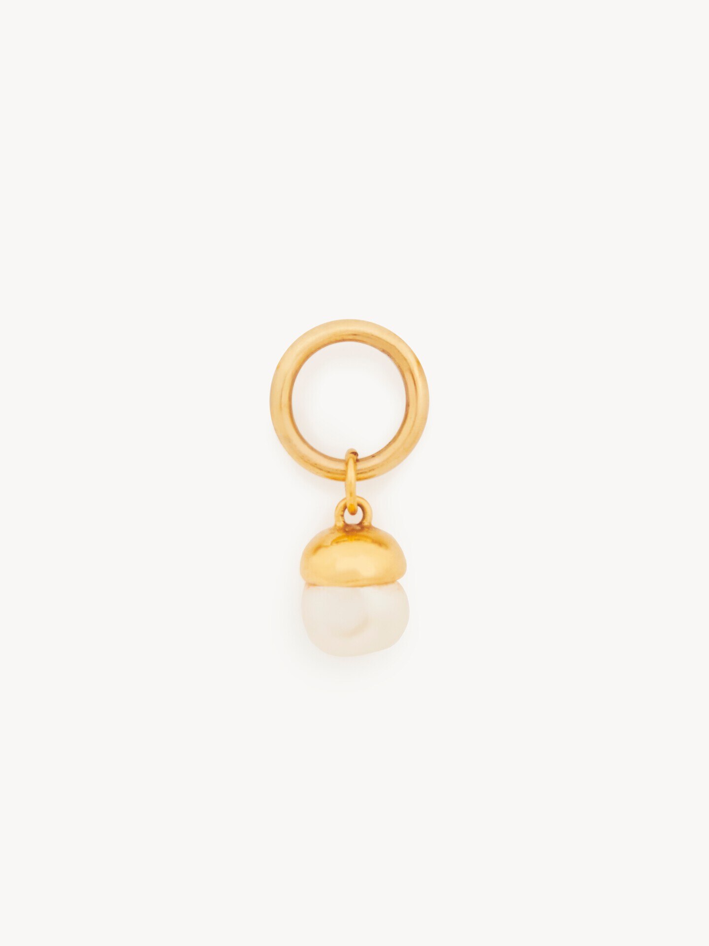 Alphabet pearl charm in pearl & brass - 1.0