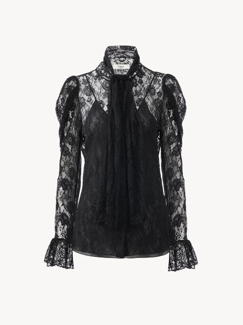 Top lavalli&egrave;re manches bouffantes en dentelle jacquard florale