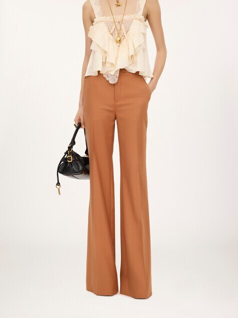 High-rise flared pants in wool gabardine