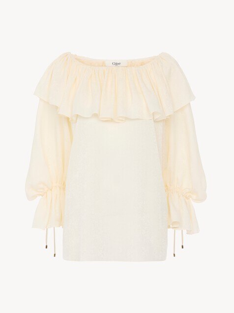Top fluido con volant in jacquard di seta