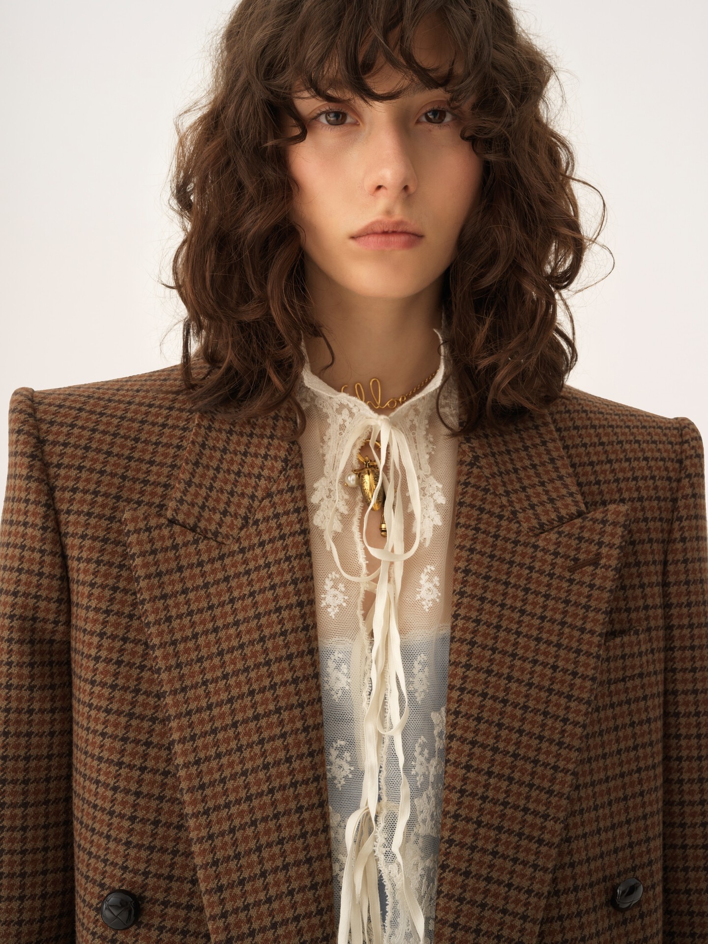 Double-breasted tailored jacket in houndstooth wool - 9