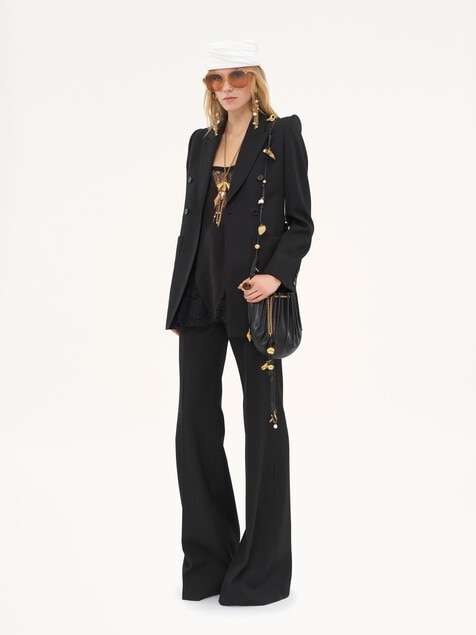 High-rise flared pants in wool grain de poudre