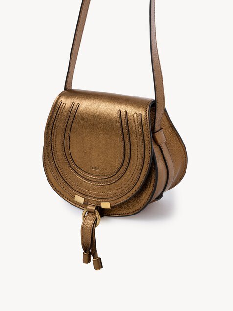 Bolso saddle Marcie peque&ntilde;o de cuero metalizado