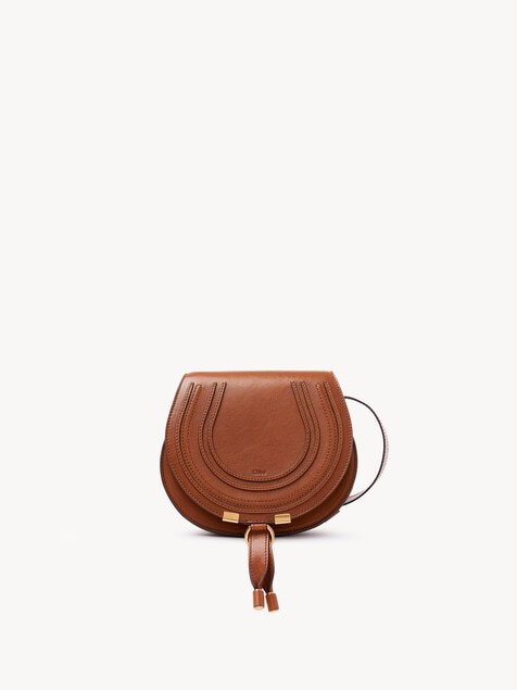 Small Marcie saddle bag in shiny leather