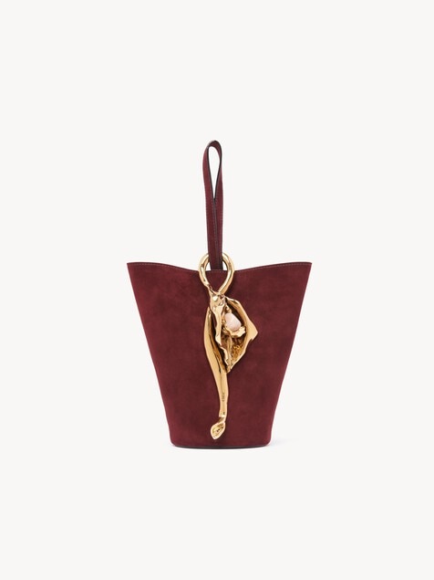 Small Eden Treasures wristlet bucket bag in suede leather