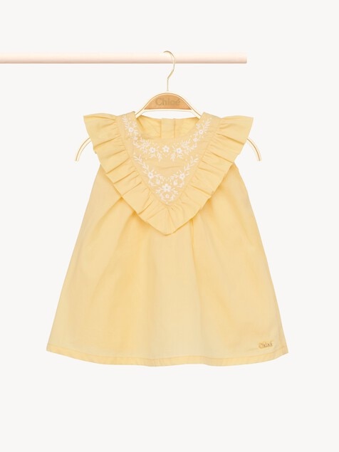 Geschenkset f&uuml;r Babys mit festlichem Kleid und Pumphose