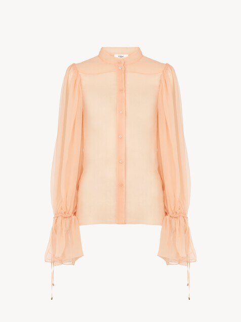 Puff-sleeve blouse in silk mousseline