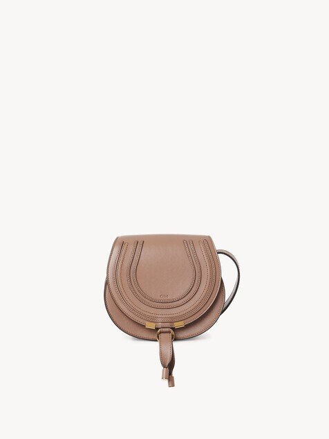 Small Marcie saddle bag in shiny leather